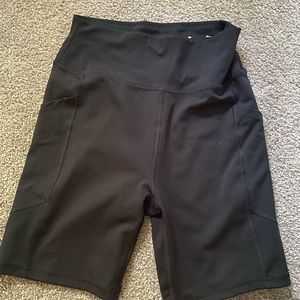 AE black pocket bike shorts. Size small